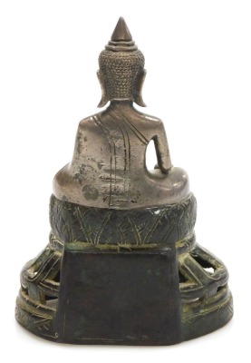 A Cambodian bronze figure, of a seated Buddha, raised on a pierced and engraved base, 15cm high. - 3