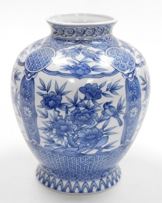 A Japanese porcelain globular blue and white vase, on flared foot, decorated with panels of flowers within geometric and floral borders, with four character mark to base, 20th century, 28cm high. - 3