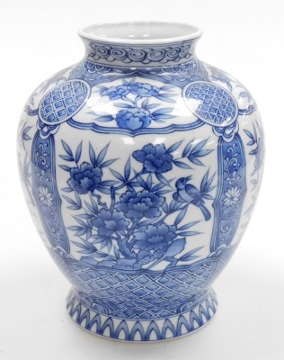 A Japanese porcelain globular blue and white vase, on flared foot, decorated with panels of flowers within geometric and floral borders, with four character mark to base, 20th century, 28cm high. - 4