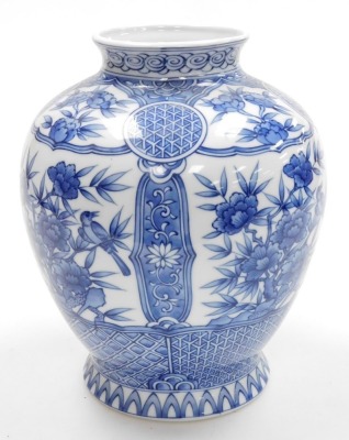 A Japanese porcelain globular blue and white vase, on flared foot, decorated with panels of flowers within geometric and floral borders, with four character mark to base, 20th century, 28cm high. - 5