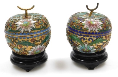 A group of Chinese porcelain and collectables, including a blue glazed dog of fo, two further dogs, and a pair of cloisonne pots and covers formed as fruit. (a quantity) - 12