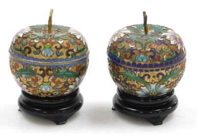 A group of Chinese porcelain and collectables, including a blue glazed dog of fo, two further dogs, and a pair of cloisonne pots and covers formed as fruit. (a quantity) - 13