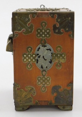 A 20thC Chinese wooden and brass bound table cabinet, with a brass lock, having two doors inset with carved jade panels, opening to reveal three drawers, raised on bracket feet, 18cm high, 14cm wide, 10cm deep (AF), together with a Chinese pillow painted - 3