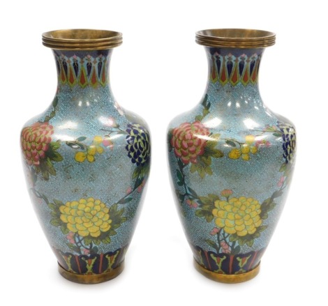 A pair of 20thC Chinese cloisonne enamel vases, decorated with flowers, 32cm high. (AF)