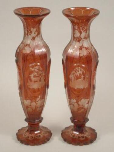 A pair of late 19thC Bohemian ruby flash vases