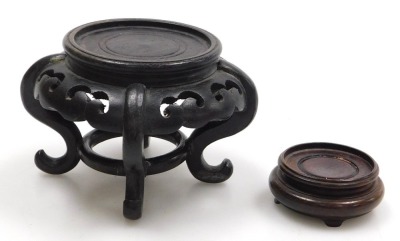 A group of Chinese carved wooden vase and urn stands. (qty) - 10