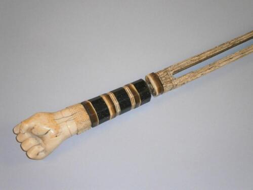 Scrimshaw. An early 19thC narwhal walking stick