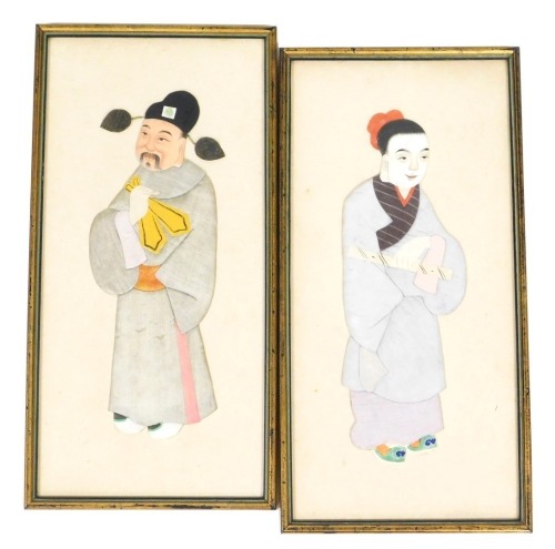 A pair of late 19thC silk relief pictures, of a gentleman and lady, 34cm x 16.5cm.