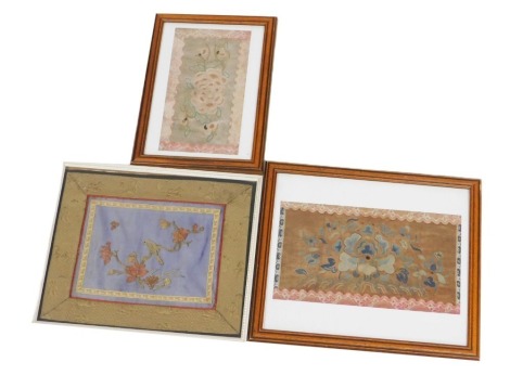 A pair of late 19thC silk embroideries, decorated with flowers, 27.5cm x 17.5cm, and 22cm x 12.5cm, and a wire work embroidery of a bird on a branch with flowers, 30cm x 24.5cm. (3)