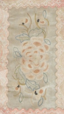 A pair of late 19thC silk embroideries, decorated with flowers, 27.5cm x 17.5cm, and 22cm x 12.5cm, and a wire work embroidery of a bird on a branch with flowers, 30cm x 24.5cm. (3) - 4