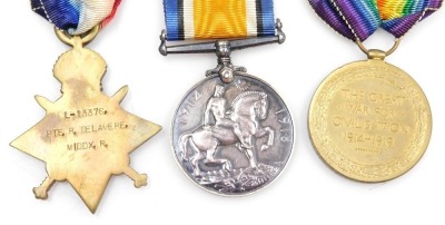 A WWI medal trio, comprising British War medal, 1914-15 Star and Victory medal, all inscribed to L-13376 Pte. R (Richard) Delamere, Middlesex Rgt., with bronze death plaque, cap badge and shoulder title. - 3