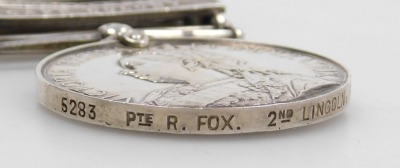 A Queen's South Africa medal, with clasps for Transvaal, Orange Free State, and Cape Colony, inscribed to 5238 Pte. R Fox, Second Lincolnshire Rgt., lacking ribbon. - 3