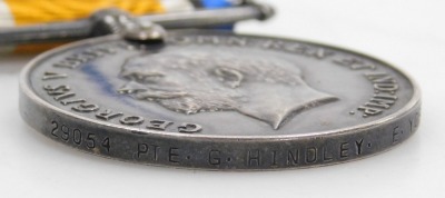 A WWI medal pair, comprising 1914-18 British War medal and Victory medal, inscribed to 29054 Pte. G Hindley, East Yorkshire Rgt. - 4