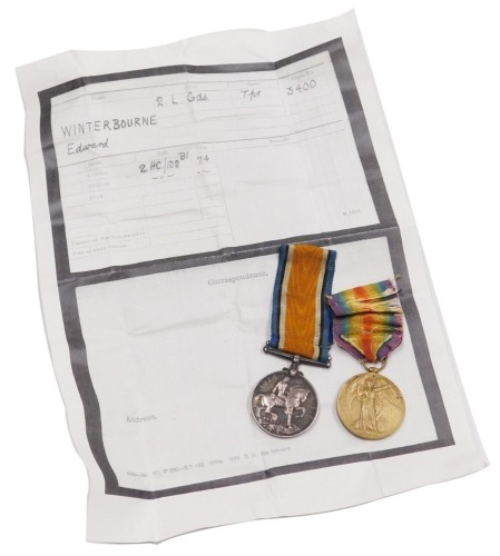 A WWI medal pair, comprising 1914-18 British War medal and Victory medal, inscribed to 3400 Tpr. E Winterbourne, 2nd Lifeguards, and with handwritten and facsimile documentation.