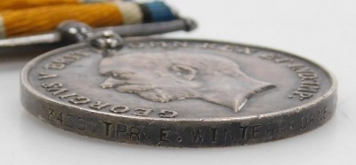 A WWI medal pair, comprising 1914-18 British War medal and Victory medal, inscribed to 3400 Tpr. E Winterbourne, 2nd Lifeguards, and with handwritten and facsimile documentation. - 4