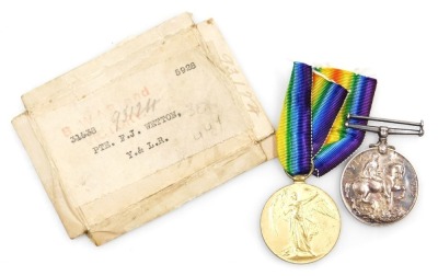 WWI medal pair, comprising 1914-18 British War medal and Victory medal, inscribed to 31538 Pte. F J Wetton, Yorkshire and Lancashire Rgt., with original issue box.