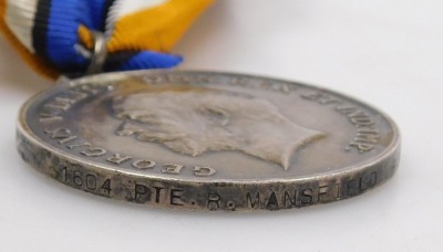 A WWI medal trio, comprising 1914-18 British War medal, 1914-15 Star and Victory medal, inscribed to T4-1604 Pte. R Mansfield, Royal Lancaster Rgt. - 4