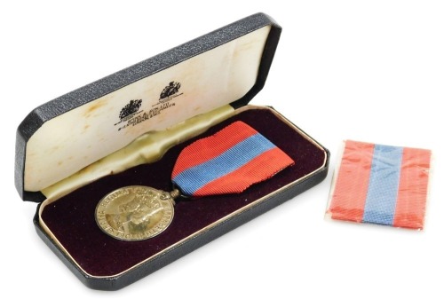 A Queen Elizabeth II Imperial Service medal, inscribed to John Stuart Hamilton, with Spink & Son fitted case, with spare ribbon.