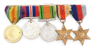 A WWI and WWII medal group, comprising Victory medal inscribed to 19876 Pte. W Hibert, East Lancs Rgt., and 1939-45 British War medal, Defence medal, Africa Star (First Army insignia) and 1939-45 Star.