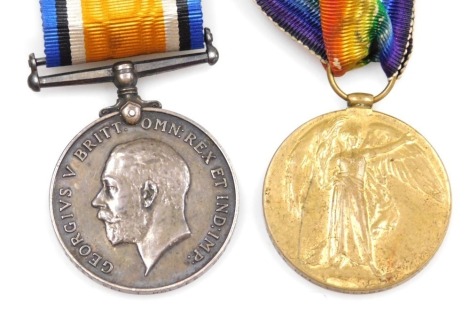 A WWI medal pair, comprising 1914-18 British War medal and Victory medal, inscribed to 35239 Cpl. T Holmes, Cheshire Rgt.