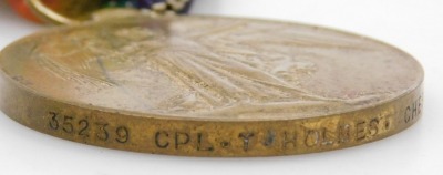 A WWI medal pair, comprising 1914-18 British War medal and Victory medal, inscribed to 35239 Cpl. T Holmes, Cheshire Rgt. - 4