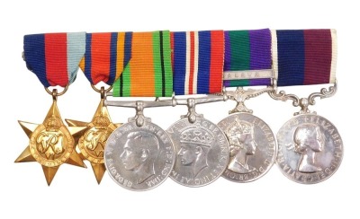 An RAF WWII and later medal group, comprising 1939-45 British War medal, Defence medal, the 1939-45 Star, Burma Star, Queen Elizabeth II General Service medal with Malaya clasp and an RAF Long Service and Good Conduct medal.