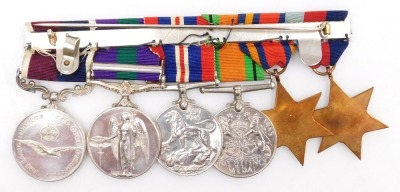 An RAF WWII and later medal group, comprising 1939-45 British War medal, Defence medal, the 1939-45 Star, Burma Star, Queen Elizabeth II General Service medal with Malaya clasp and an RAF Long Service and Good Conduct medal. - 2