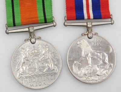 A WWI medal pair and later associated family medals, comprising 1914-18 British War medal and Victory medal, inscribed to 85536 Gnr. F Wilson, Royal Artillery, 1939-45 British War medal and Defence medal, and George VI General Service medal with South Eas - 3