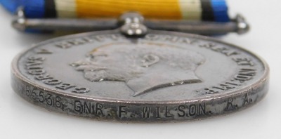 A WWI medal pair and later associated family medals, comprising 1914-18 British War medal and Victory medal, inscribed to 85536 Gnr. F Wilson, Royal Artillery, 1939-45 British War medal and Defence medal, and George VI General Service medal with South Eas - 7