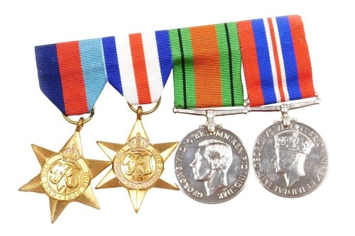 A WWII medal group, comprising 1939-45 British War medal, Defence medal, 1939-45 Star and the France and Germany Star.