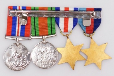 A WWII medal group, comprising 1939-45 British War medal, Defence medal, 1939-45 Star and the France and Germany Star. - 2