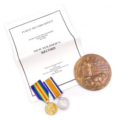 WWI medal pair and death plaque, comprising 1914-18 British War medal and Victory medal, with death plaque named to Joseph Lawson, the medals inscribed to 202984 Pte. J Lawson, Lincolnshire Rgt.