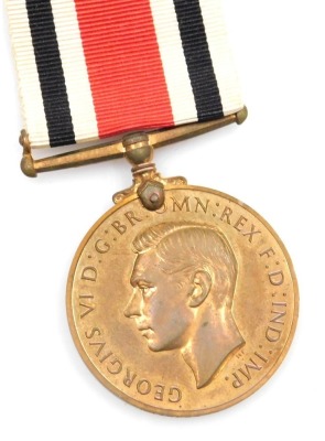 A George VI Special Constabulary Faithful Service Medal, inscribed Charles Simmons.