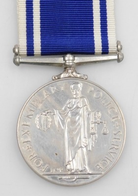 A Queen Elizabeth II Police Long Service and Good Conduct Medal, inscribed Constable Ronald A Fowers. - 2