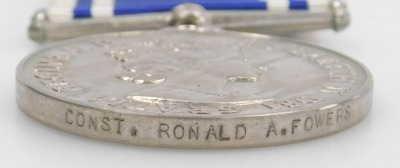 A Queen Elizabeth II Police Long Service and Good Conduct Medal, inscribed Constable Ronald A Fowers. - 3