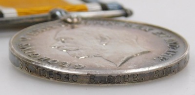 A WWI medal trio, comprising 1914-18 British War medal, 1914-15 Star and Victory medal, inscribed SS106540 B Cob Stoker 1 Royal Navy, (replacement ribbons). - 3