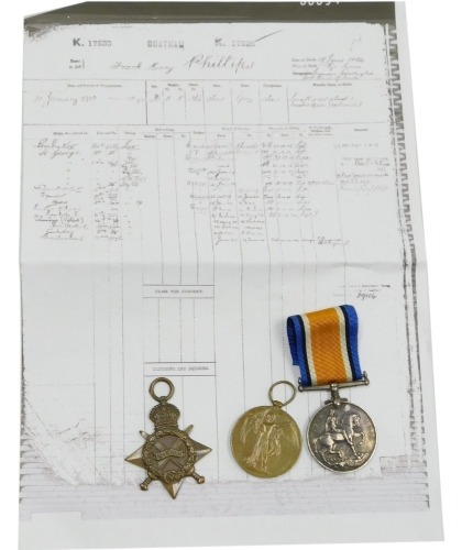 A WWI medal trio, comprising 1914-18 British War medal, 1914-15 Star and Victory medal, inscribed K17533 FH Phillips, L.Sto. Royal Navy with facsimile documentation.