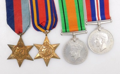 A WWII medal group, comprising 1939-45 British War medal, Defence medal, 1939-45 Star and Burma Star, with original OHMS box, addressed to F/Lt GA Grassby, Barton on Humber, Lincolnshire and tunic ribbons. - 2