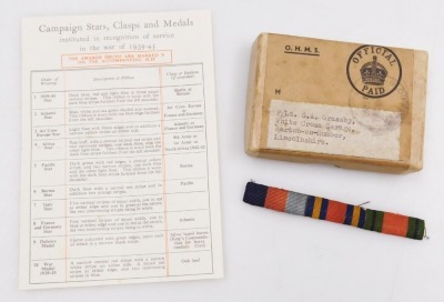 A WWII medal group, comprising 1939-45 British War medal, Defence medal, 1939-45 Star and Burma Star, with original OHMS box, addressed to F/Lt GA Grassby, Barton on Humber, Lincolnshire and tunic ribbons. - 4