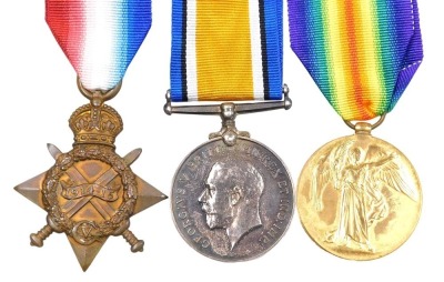 A WWI medal trio, comprising 1914-18 British War medal, 1914-15 Star and Victory medal, inscribed 11974 Pte. HA Wright, Manchester Rgt., all with replacement ribbons.