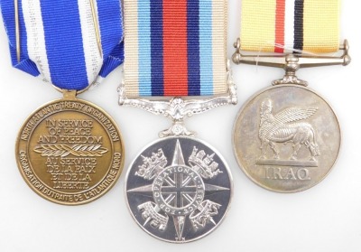 An Operation Service medal and Iraq Medal, and NATO Medal in Service of Peace and Freedom, the Operation Service Medal with Afghanistan ribbon and clasp, and the Iraq Medal both inscribed to 25179710 Pte. AL Cook, Para, with original boxes. - 3