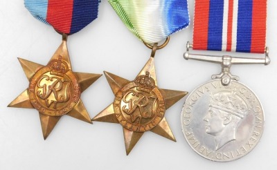 A WWII medal group, comprising 1939-45 British War medal, Atlantic Star and 1939-45 Star, to E Rushden, Bond Street, Macclesfield; as detailed on OHMS box, and Advanced Motorist medal for 1970, '71 and '72. - 2