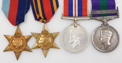 A George VI medal group, comprising 1939-45 War medal, Burma Star and 1939-45 Star, and General Service medal with South East Asia 1945-46 clasp, inscribed to 14724951 Pte J Lane West Yorkshire Regiment, with cap badge Battalion shoulder titles and medal - 2