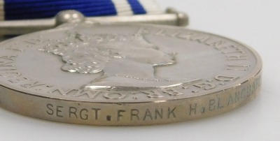 An Elizabeth II Police Long Service and Good Conduct medal and Defence medal, the Police medal inscribed to Sgt Frank H Blanchard. - 3