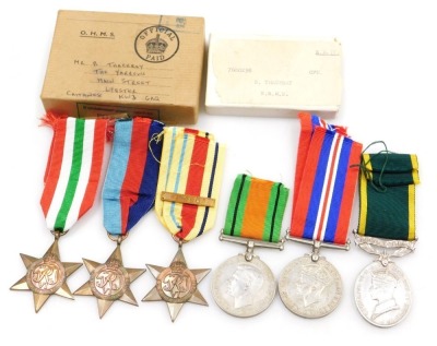 A WWII medal group, comprising 1939-45 British War medal, 1939-45 Star, Italy Star, Africa Star with 1st Army clasp, Defence medal and George VI Territorial Efficiency medal, with original box to 7600298 B Thackray REME.