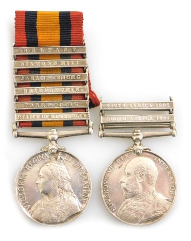 A Queen's South Africa medal and King's South Africa medal, Queen's South Africa medal with clasps for Belfast, Diamond Hill, Johannesburg, Driefontein, Paardeberg and Relief of Kimberley, the King's medal with clasps for South Africa 1901 and 1902 (lacki