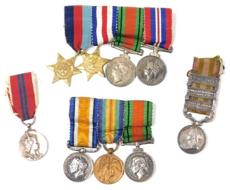 A small collection of miniature medals, including an India medal with clasps for Tirah 1897-98, Punjab Frontier 1897-98, and Relief of Chitral 1895, inscribed to Capt THM Green Second Derbyshire Regiment, various other later miniature medals. (9)