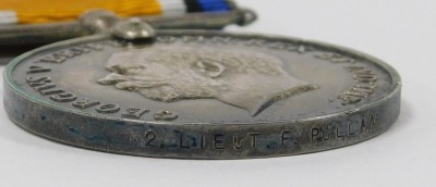 A WWI medal trio, comprising 1914-18 British War medal, 1914-15 Star and Victory medal, inscribed to 2nd Lieut F Pullam Killed in Action 19/06/18, and with North Staffordshire sealed knot cap badge. - 4