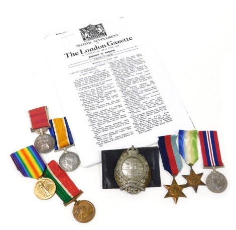 A WWI and WWII BEM medal group, comprising George V British Empire medal, 1914-18 British War medal (un-named) and Victory medal, Mercantile Marine medal, inscribed to William Galyer with Mine Clearance Service badge (Grimsby Trawlers), and WWII group inc