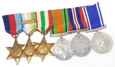 A WWI pair and WWII group with police interest, comprising 1914-18 British War medal and Victory medal inscribed to 240497 Sgt H Swinn Lincolnshire Regiment, and WWII medal group for his son PC George Swinn ex Royal Navy, Boston Borough Police and Lincoln - 6